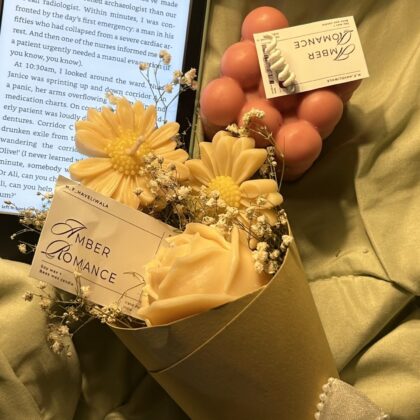 Shop Full Width Rose and Daisies Candle bouquet with beautiful pearl Bow.